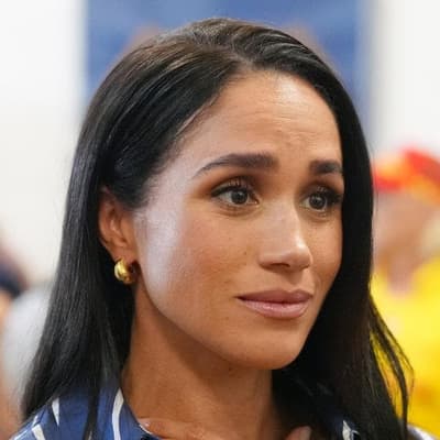 Meghan hit by claim her father had child abuse images