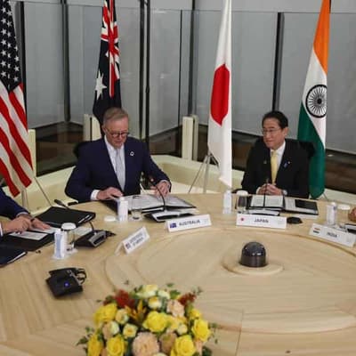 Quad spruiks 'force for good' on sidelines of G7 summit