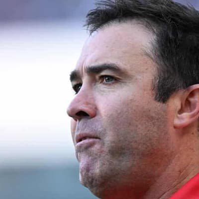 Bombers coach Scott leaps to Adam Simpson's defence