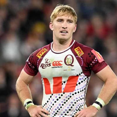 McDermott back at Reds training after head knock