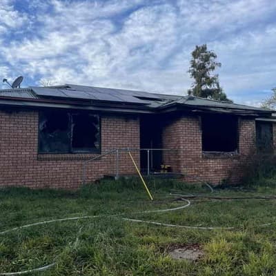 Woman dead, 10yo boy critical following house fire