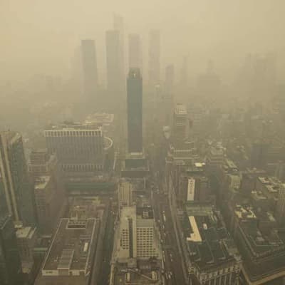 Canada wildfires blaze as smoky haze blankets US cities