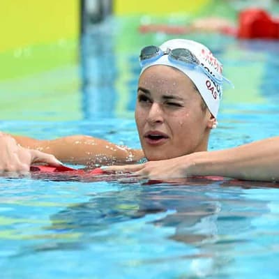 McKeown blitzes backstroke field in world swim trials