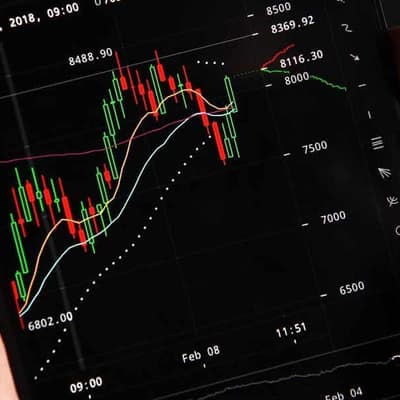 Australian stocks edge up to end mixed half year