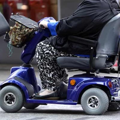 NDIS marks 10 years with tricky road of reforms ahead