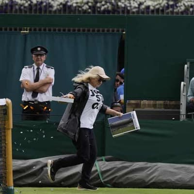 Aussie Saville's match at Wimbledon hit by protester