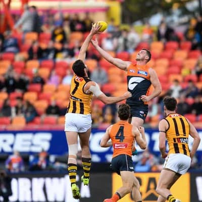 Hogan the hero as Giants dig deep to keep Hawks at bay