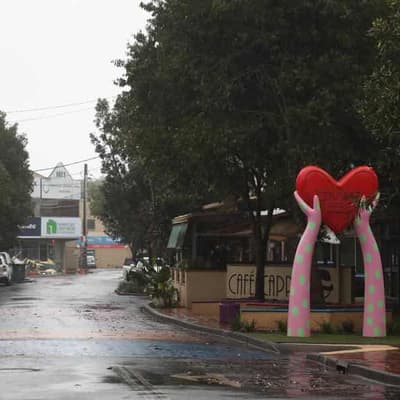 Tension in flood town as premier flags recovery pivot