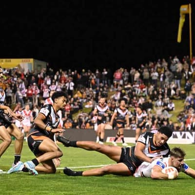 Tigers close on NRL wooden spoon with loss to Dragons