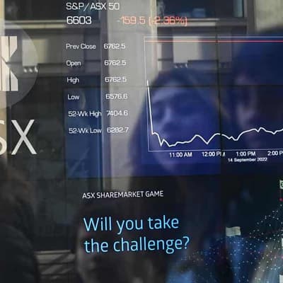 Australian shares dip, but finish week modestly higher