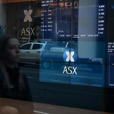 Australian shares edge up for best month since January