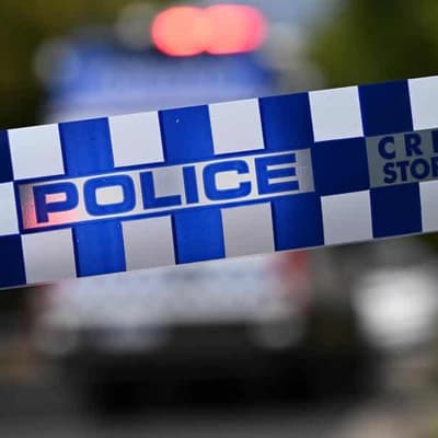 Woman dies, man under police guard in hospital