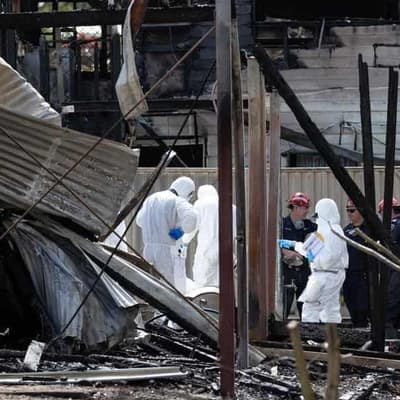 Plea for answers as community mourns loss of boys, dad