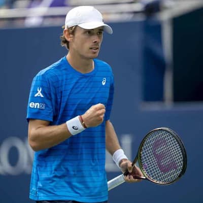 Red-hot de Minaur downs Medvedev in career-best win