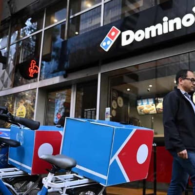 Domino's profit sliced 74 per cent as inflation bites