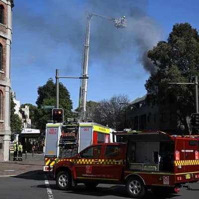 Man's body found after blaze rips through apartment