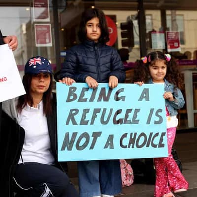 Dozens of asylum seekers protest against legal limbo