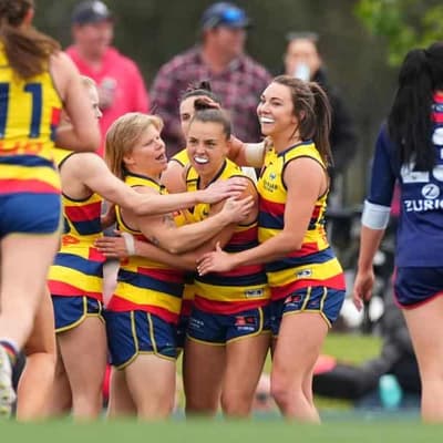 Crows beat Dees in thriller to go outright top in AFLW