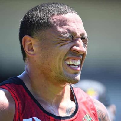 Woolf's Tonga go down battling in England Test