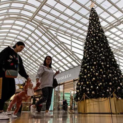 Retail sales dig in with hotter than expected growth