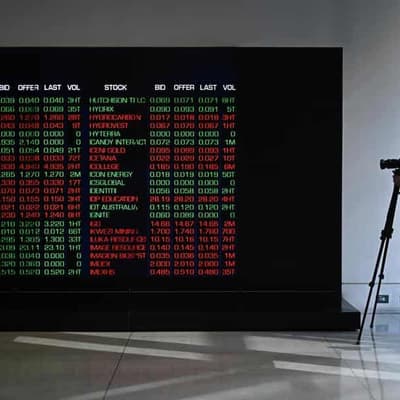 Australian shares drop on hawkish talk from Fed chief