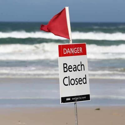 School beach ban backflip after rash of shark attacks