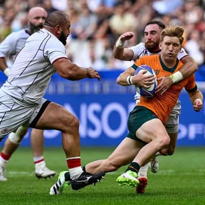 Rugby trials lower tackle height for safer play